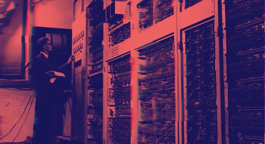 Dark image of a person reflected in a mirror with a woman in the background